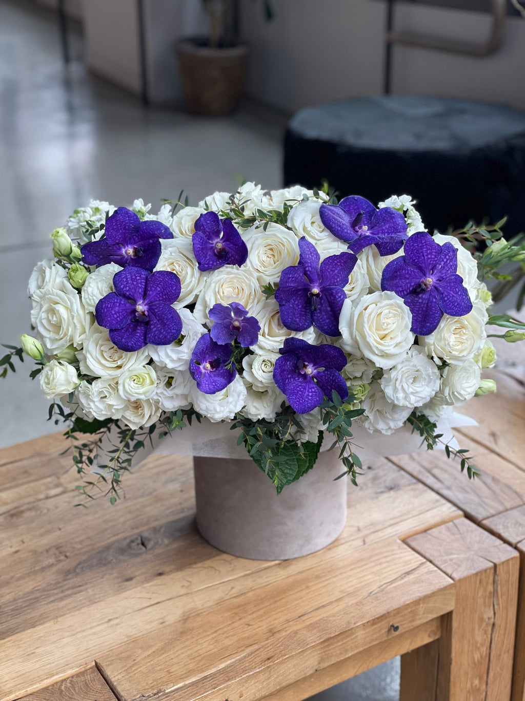 Box with purple orchids
