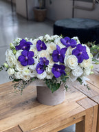 Box with purple orchids