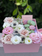 Gift box Flowers and macaroons