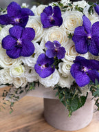Box with purple orchids