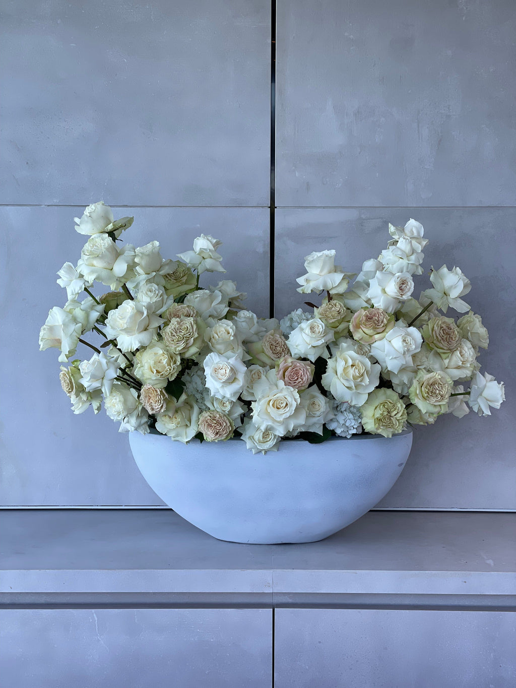 White Roses in Elegant Vase
