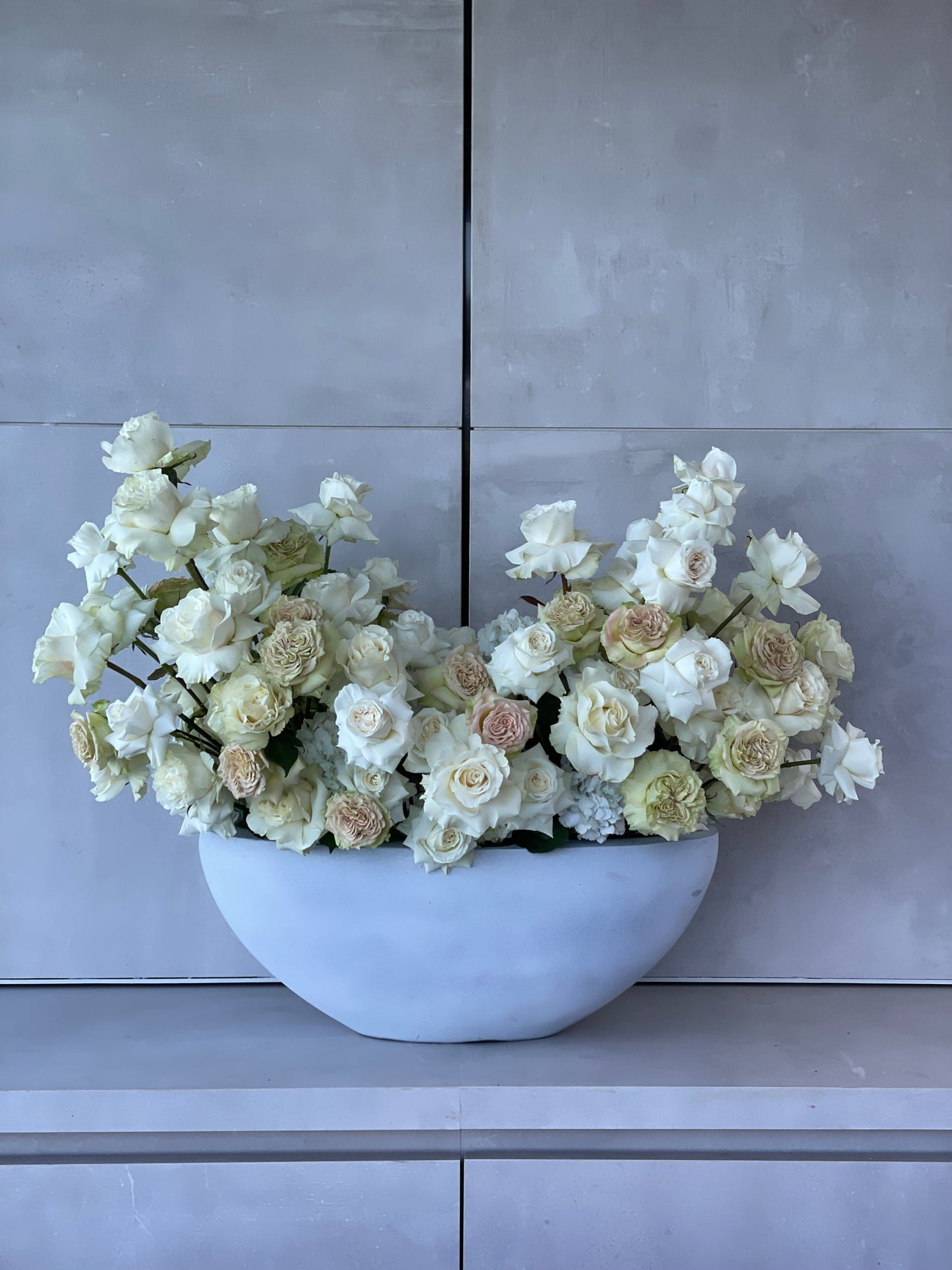 Exclusive vase with exquisite shades of the most beautiful white roses