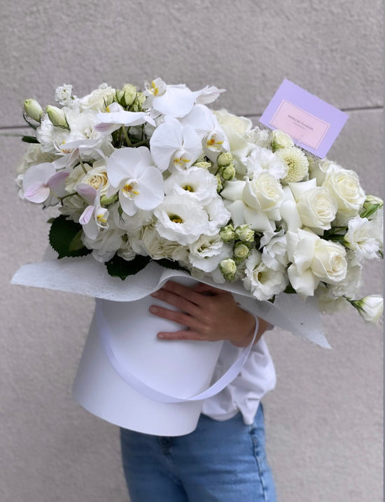 White box with white flowers plus delivery fee