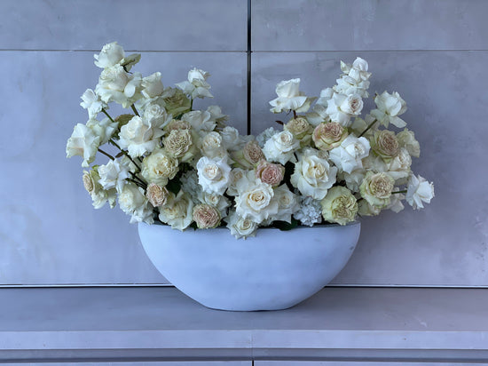 Exclusive vase with exquisite shades of the most beautiful white roses